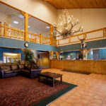 wood paneled front desk and lobby area of the Summit Inn
